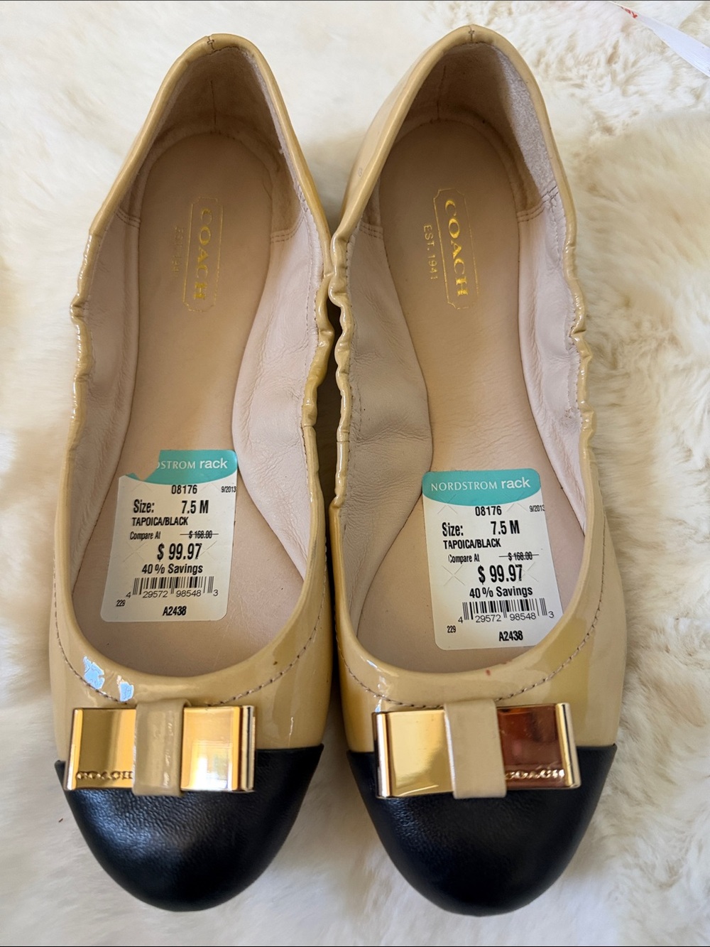 Coach Two-Tone Patent Leather Ballet Flats in Beige and Black with Gold Bow